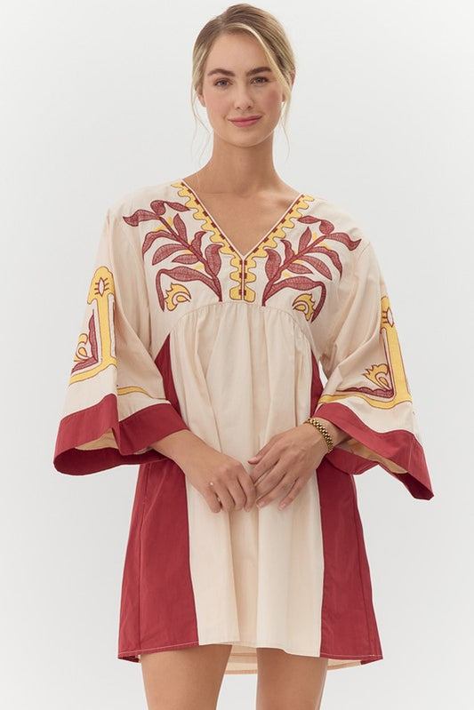 Embroidered baby doll dress